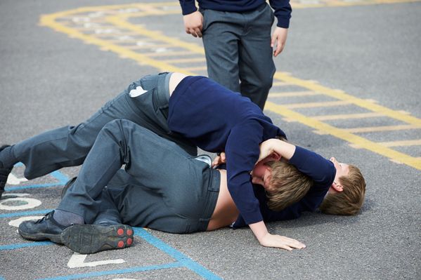 Two Boys Fighting in Playground
