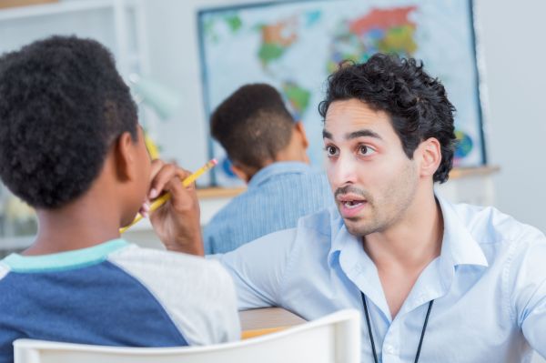 003 - CR - Male teacher disciplines student in class